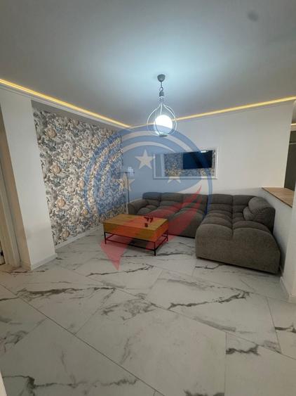 Apartament cu 3 camere semidecomandat în Romanești