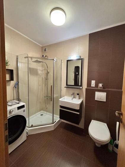 Apartament tip vila cu curte,2 camere,2 bai , loc parcare - 16