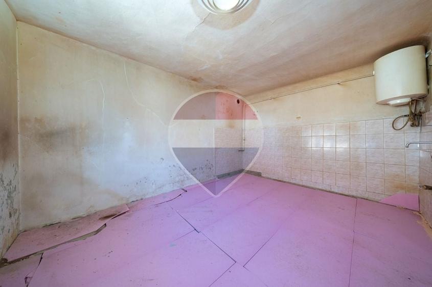 Casă individuală cu 2 camere cu Teren 620 Mp în Centrul Istoric