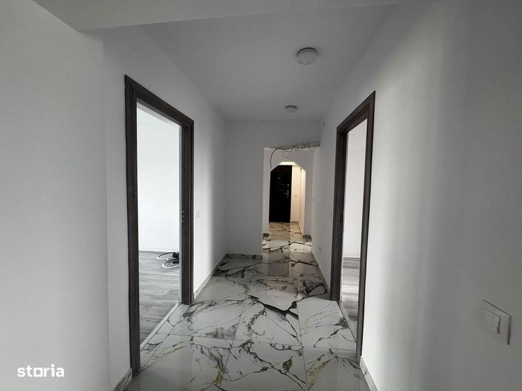 Apartament cu 4 camere decomandat în Prundu