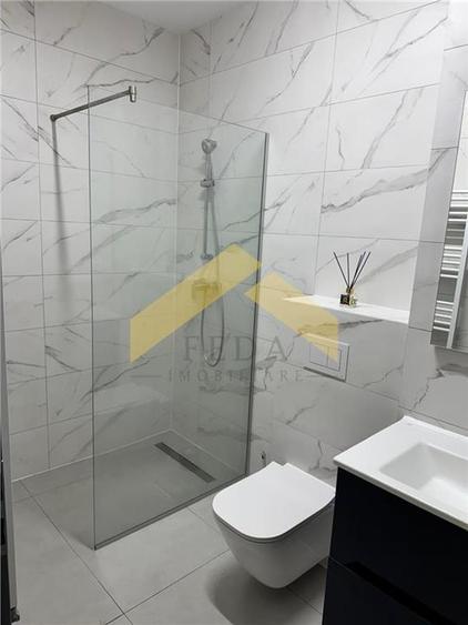 Apartament cu 2 camere semidecomandat, mobilat în UTA