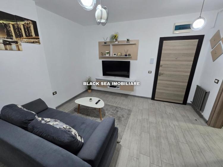 Apartament cu 2 camere, mobilat în Central