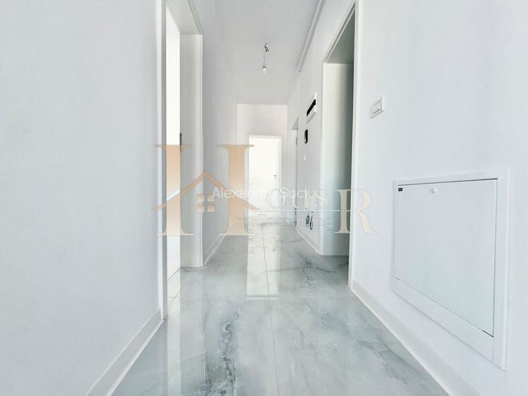 3 camere.Decomandat.Bucatarie inchisa.2 bai!
