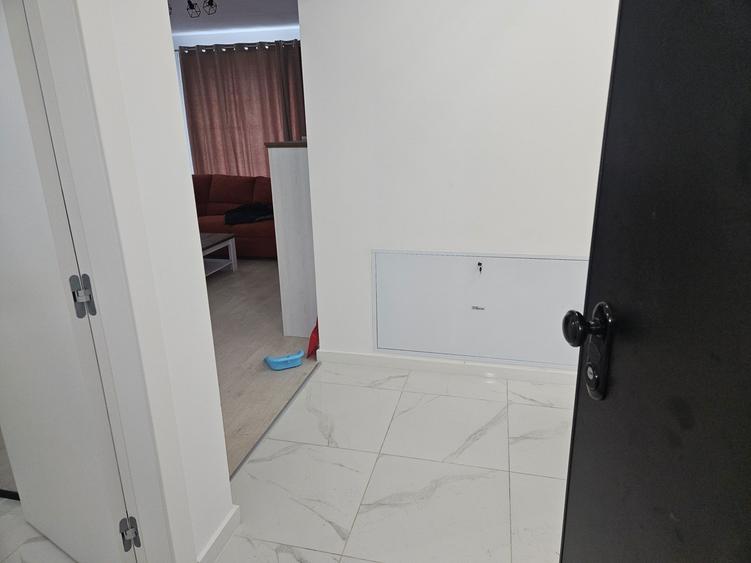 Apartament cu 3 camere decomandat în Cățelu