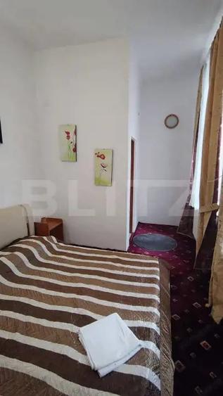 Casă cu 11 camere cu Teren 670 Mp în Clăbucet