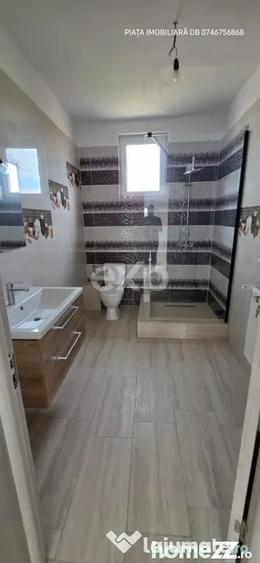 Casă cu 8 camere cu Teren 1388 Mp în Voinești