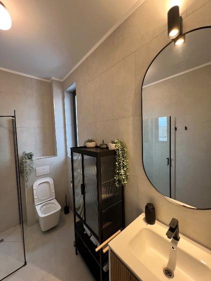 Apartament cu 2 camere semidecomandat, mobilat în Central