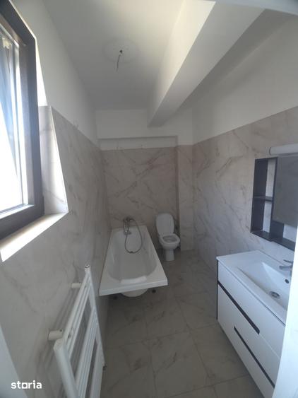 Casă cu 4 camere cu Teren 120 Mp în Central