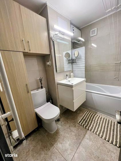Apartament cu 2 camere semidecomandat, mobilat în Girocului