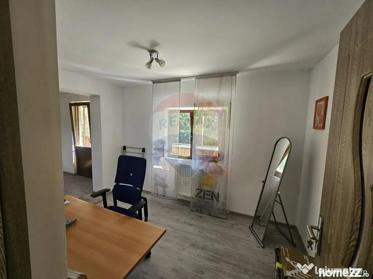 Casă cu 7 camere cu Teren 1134 Mp în Tarcău
