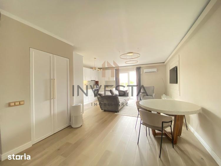 Apartament cu 4 camere semidecomandat, mobilat în Borhanci