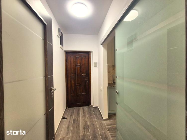 Apartament cu 2 camere semidecomandat, mobilat în Tractorul