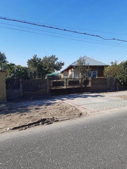 Casă cu Teren 2000 Mp în Comana