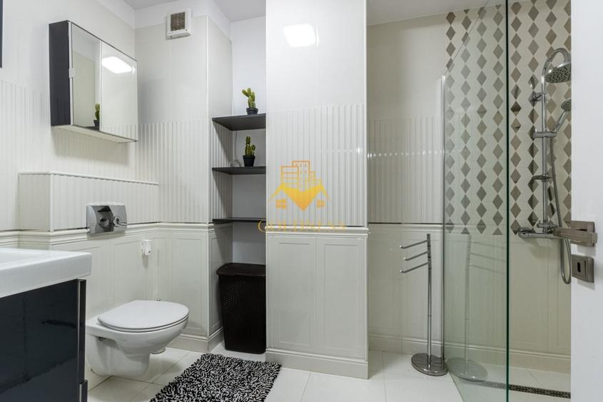 Apartament cu 2 camere semidecomandat, mobilat în Central
