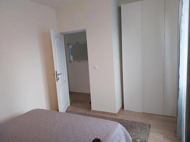Apartament cu 2 camere semidecomandat, mobilat în Podul de Fier