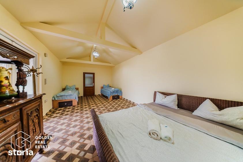 Casă cu Teren 1597 Mp în Ghioroc