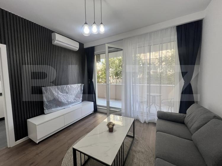 Apartament cu 2 camere semidecomandat, mobilat în Florești