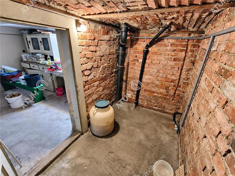 De vanzare casa cu 3 camere pivnita garaj si 508 mp teren in Sibiu - 28
