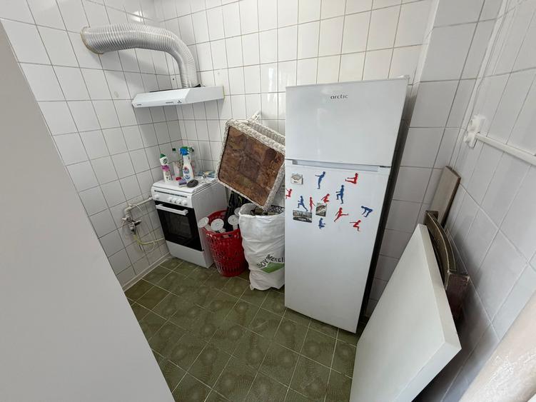 Garsonieră decomandată în Titan