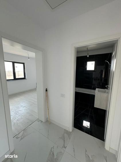 Casa in Clinceni cu incalzire in pardoseala, placa de beton si tripan - 13