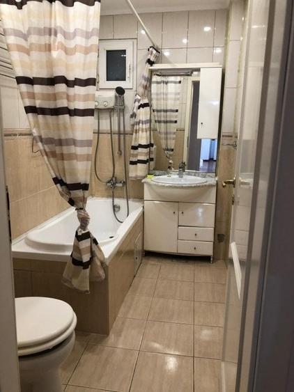 Apartament cu 3 camere semidecomandat în Romană