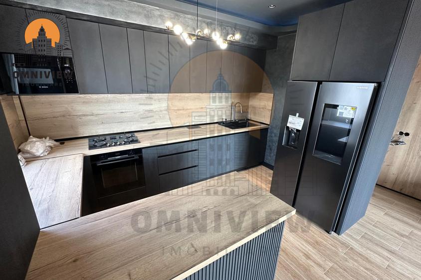 Apartament cu 4 camere decomandat în Tractorul