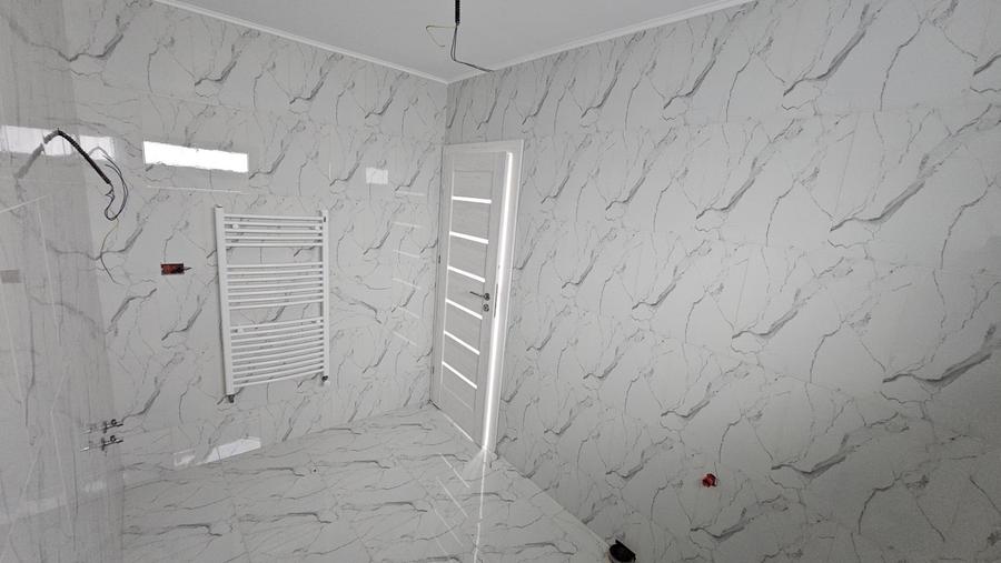 Casă cu 5 camere cu Teren 490 Mp în Păulești