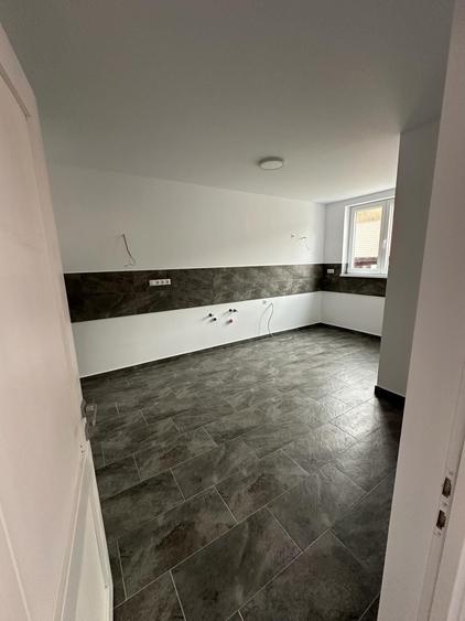 Casă cu 4 camere în Corunca