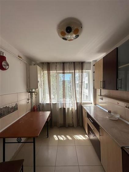 Apartament cu 2 camere semidecomandat, mobilat în Podu Roș