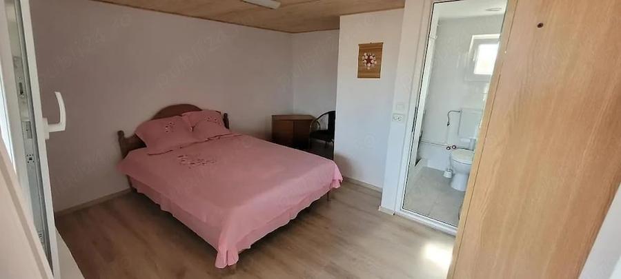 Casă cu 9 camere cu Teren 300 Mp în Central