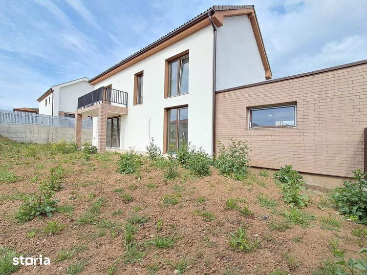 Casa cuplata prin garaj 23 mp, sup.totala 147 mp,teren 400 mp Chinteni - 14