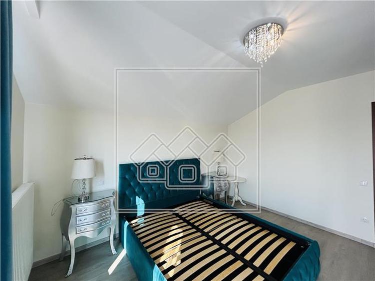 Ap pe 2 niveluri, 75 mp utili + 2 balcoane, mobilat modern - 14
