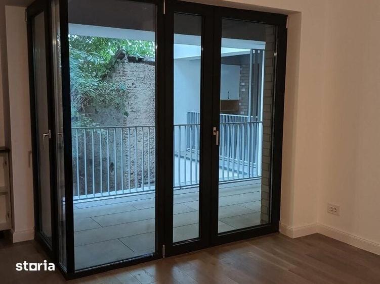 Apartament cu 2 camere decomandat în Centrul Istoric