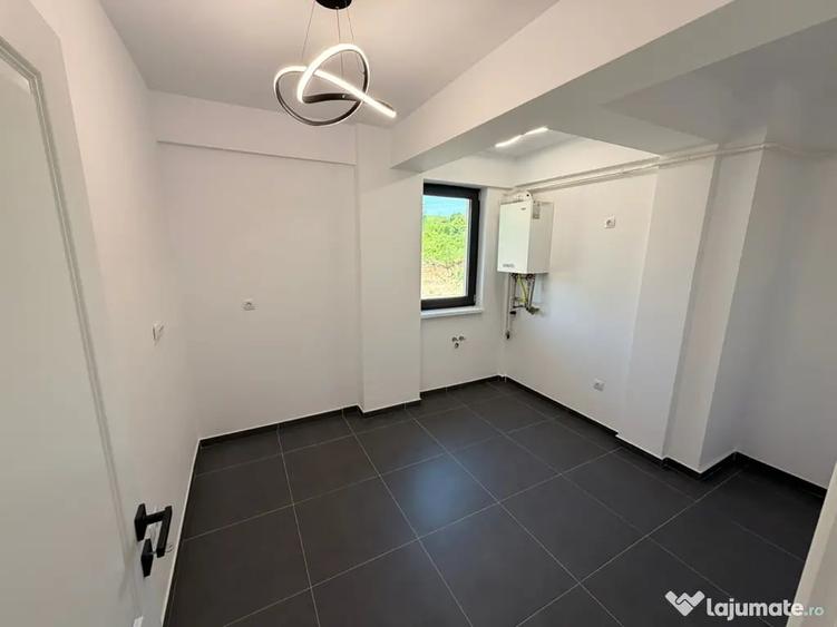 Apartament cu 3 camere decomandat în Bucium