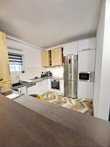 Apartament cu 2 camere semidecomandat, mobilat în Borhanci