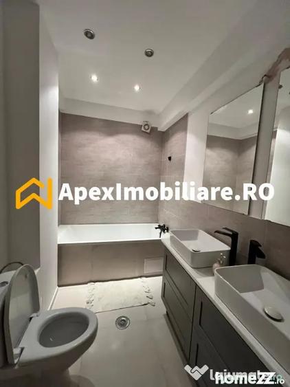 Apartament cu 3 camere semidecomandat, mobilat în Universitate