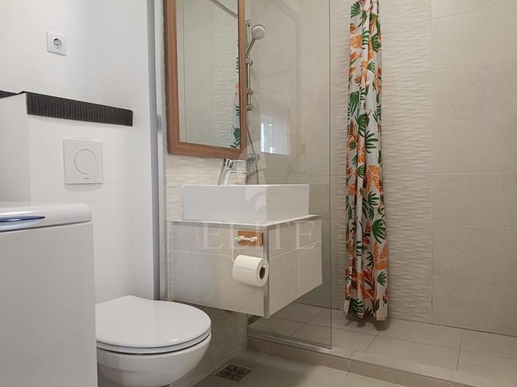 Apartament cu 2 camere semidecomandat, mobilat în Central