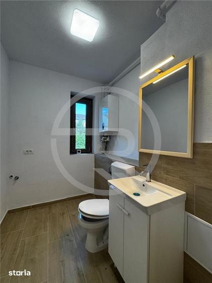 Apartament cu 3 camere semidecomandat în Borhanci
