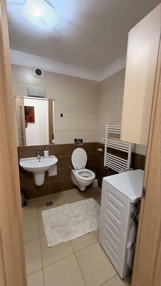 Apartament cu 2 camere decomandat în Tractorul