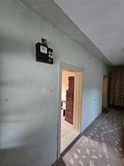 Casă cu 4 camere decomandat în Buntești