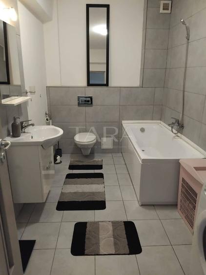 Apartament cu 2 camere semidecomandat, mobilat în Baciu