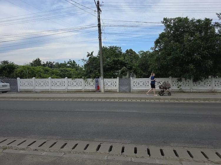 Casă cu Teren 1000 Mp în Central