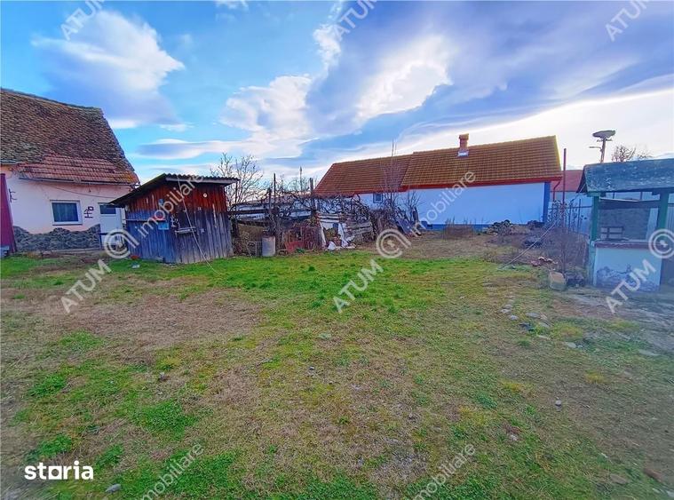 Casă cu 4 camere decomandat cu Teren 1650 Mp în Porumbacu de Jos