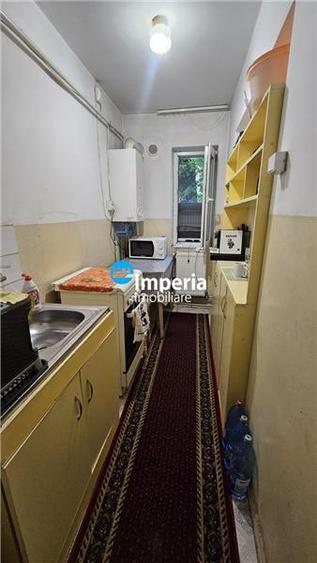 Apartament cu 2 camere semidecomandat în Podu Roș