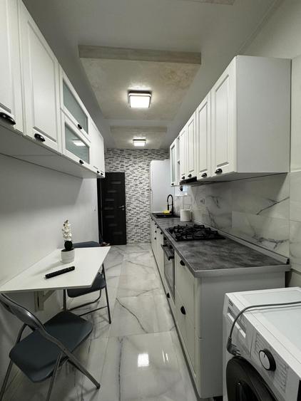 Apartament cu 2 camere decomandat în Podul de Fier