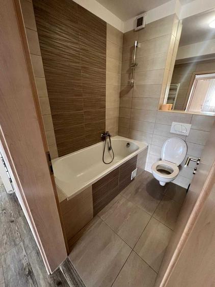 Apartament cu 2 camere decomandat în Tractorul