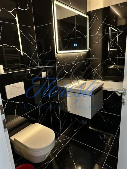 Apartament cu 2 camere semidecomandat, mobilat în Mărăști