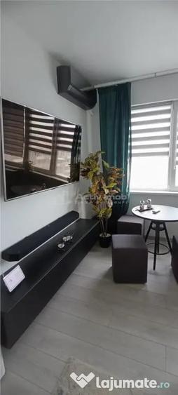 Apartament cu 3 camere semidecomandat în 1 Mai
