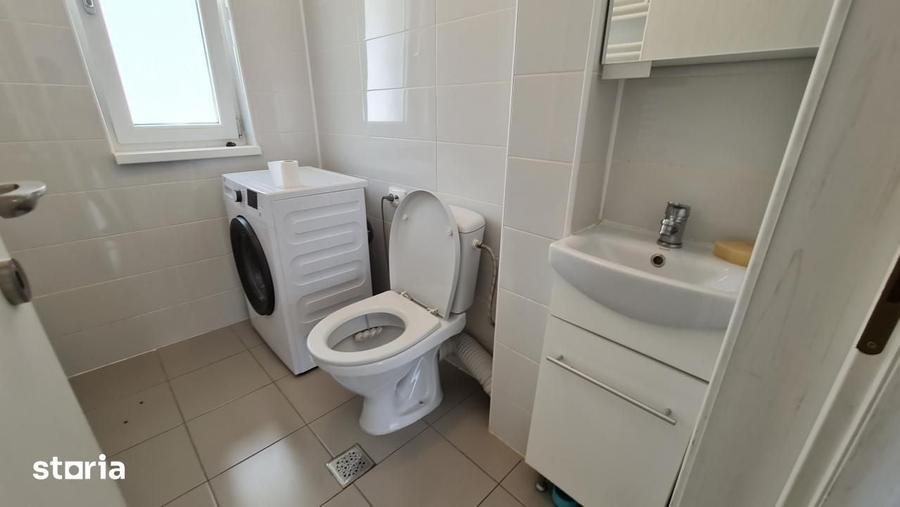 Casă cu 4 camere decomandat cu Teren 250 Mp în Tunari