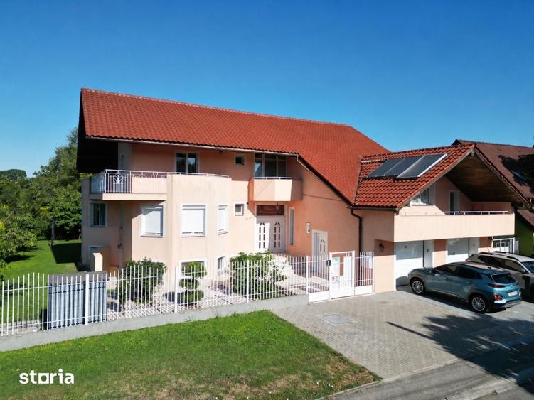 Casă cu Teren 964 Mp în Est